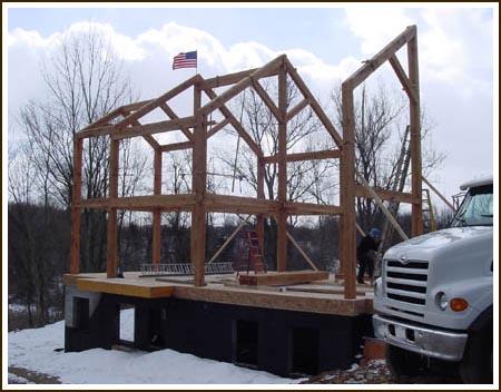 photograph of the timber frame being erected